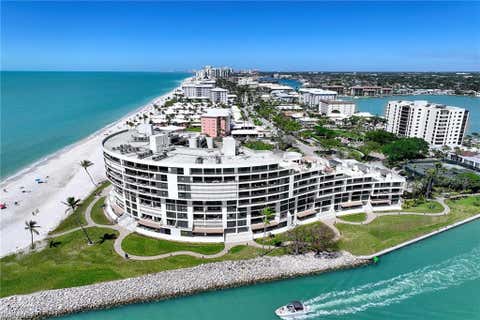 Photo of 2389 Gulf Shore BLVD N #302, NAPLES, FL 34103 (MLS # 225076314)