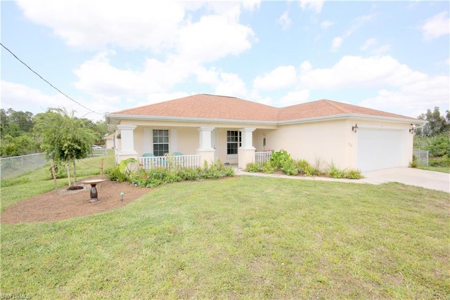 ***MOVE IN READY POOL HOME*** Beautiful 3 bedroom 2 bathroom pool home in a quiet area near Buckingham. Build in 2006 with over 1400sqft. Fully fenced yard with fresh landscaping in front and palms in the backyard for privacy. Screened in pool cage and lanai. Lanai runs the length of the back of the home, giving plenty of room to enjoy the pool and seating area. Enclosed garden located in the back corner the yard. This home also features a video surveillance security system that is installed and ready to go! Currently located between two vacant lots. SCHEDULE A SHOWING TODAY! THIS PROPERTY WILL NOT LAST LONG!