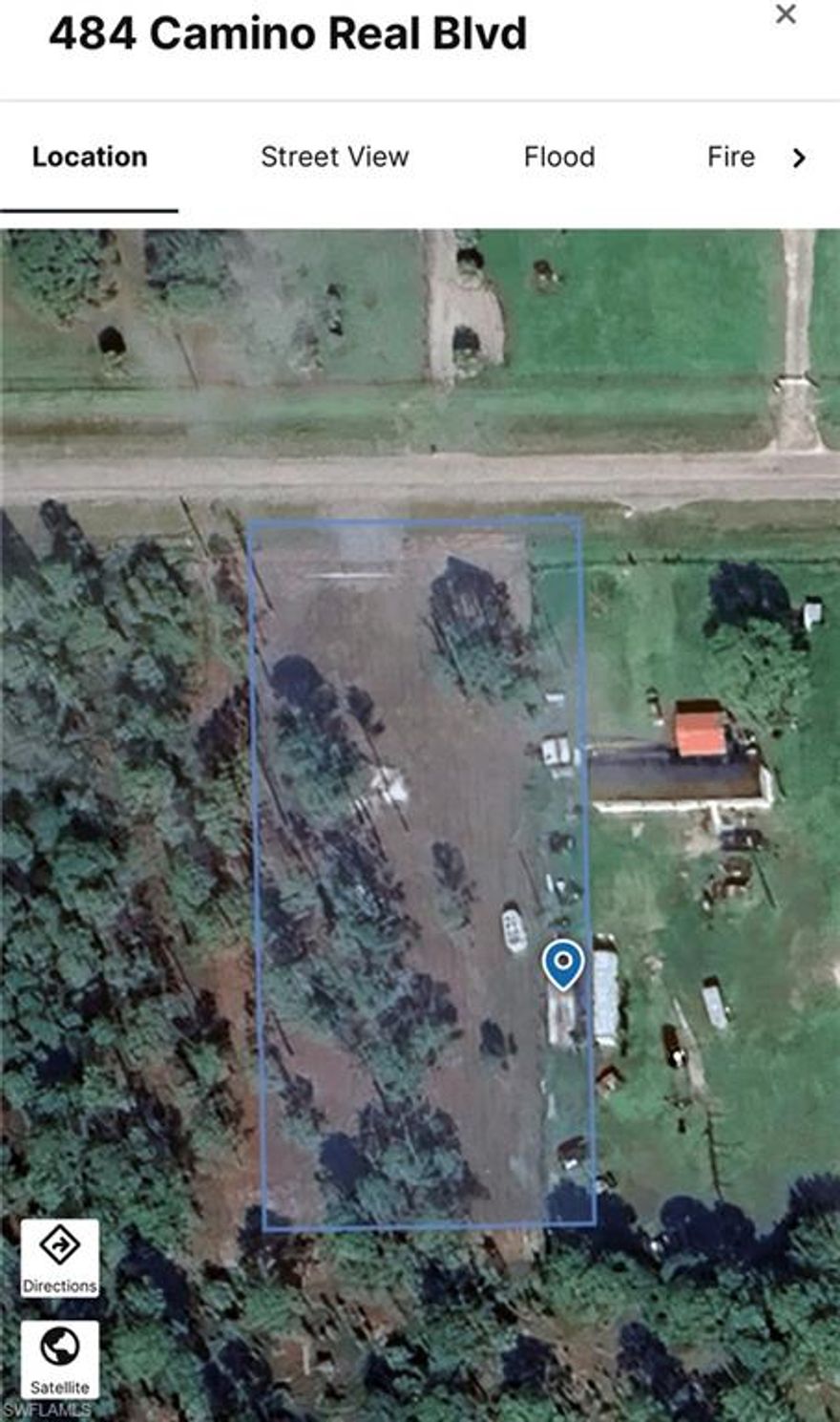 1.09 Acre lot in the heart of montura ranches on a paved road, with a new chain link fence with a manicured lot & drive way, ready to build your dream home.