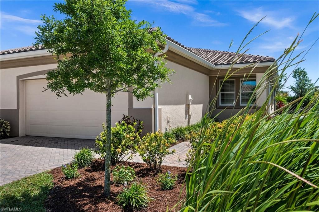 Photo of 10353 Bonavie Cove DR, FORT MYERS, FL 33966 (MLS # 226016818)