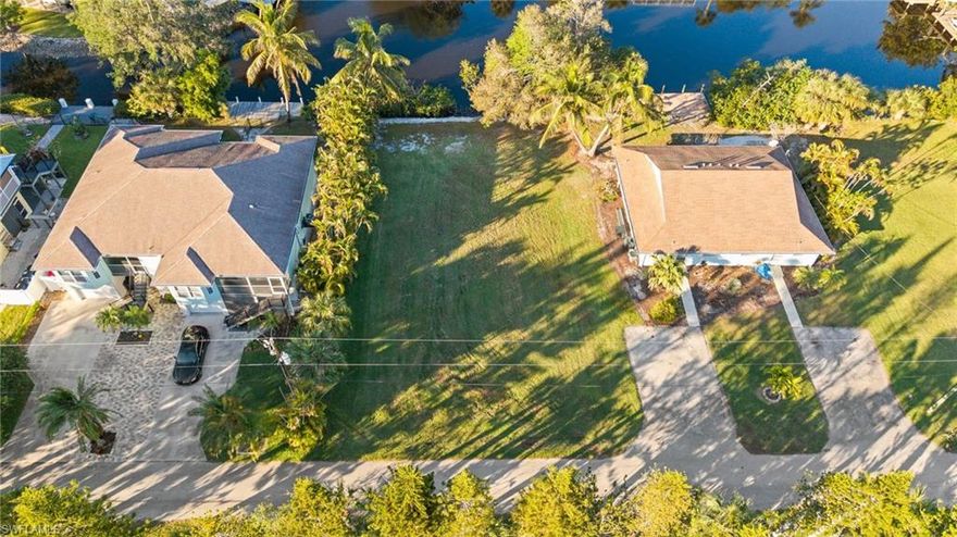 This spectacular lot is located on one of the most desirable areas of Bonita Springs. Build your Florida dream home on this waterfront lot, clear, and with a new rock riprap. West to 41 road and only a few miles to Barefoot Beach and Bonita Beach. Access ramp to the wide waters of the Imperial River just around the corner in just minutes you will be on the Gulf of Mexico.