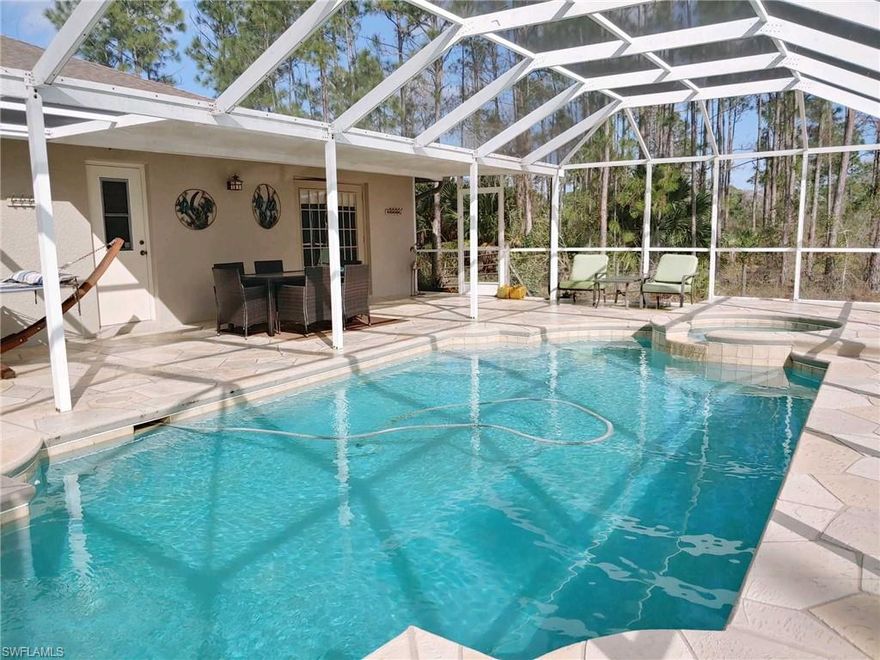 4/2/2 with gas heated pool and spa with highly sought out rear southern exposure.  This home features tile throughout the main living areas, custom cabinetry installed in the garage with an upgraded floor coating, custom master closet and custom pantry.  1.14 acre parcel with partial fence enclosure.  Home is set back 150 feet from road.  Gas tanks are owned, not rented.  New Culligan water system recently installed.  Home is well maintained and move-in-ready.