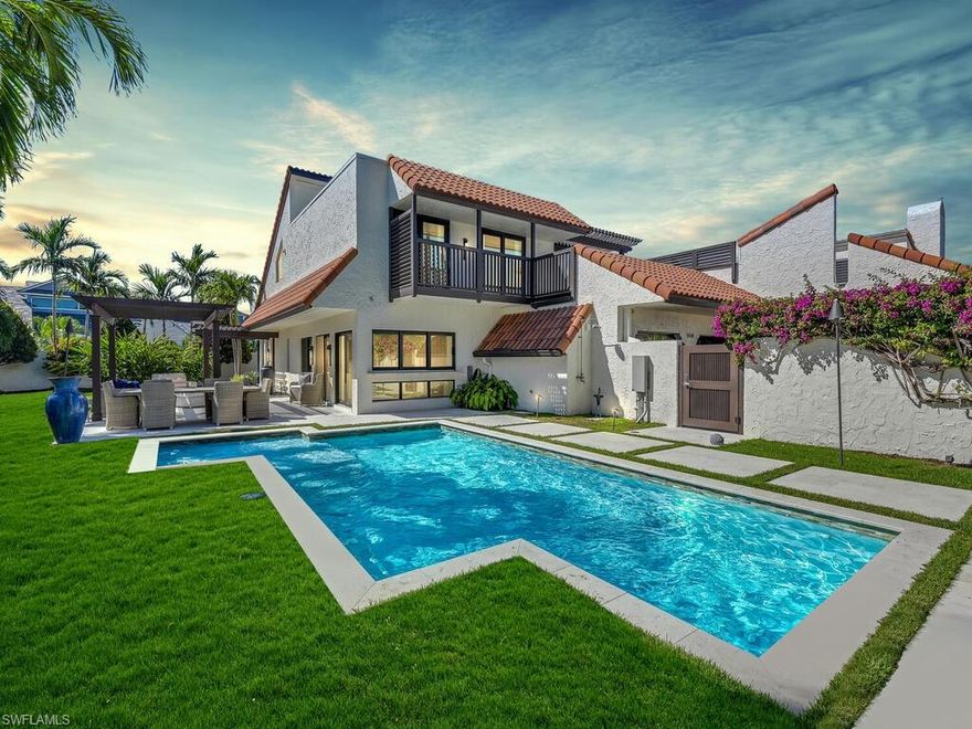 Rare opportunity to own a spacious 4 bedrooms and 3-1/2 bath home in Tierra Mar within beautiful Pelican Bay!  Enjoy large private yard with private pool oasis!  Sophisticated remodel (down to the studs --all new pipes, plumbing, electric, HVAC) with timeless selections in 2017!   A few upgrades include: Wolf and Subzero Appliances, Custom Cabinetry, Dry Bar with Ice Maker and Refrigerator Drawers, Taj Mahal Countertops, Laundry in Master and Laundry on Second Floor, Lagno Bastone Wide-Plank Wood Floors, Two Upper Balcony's with new Teak Floor Systems, Shell Stone Pool Deck and Patios, Custom Trellis, New Auto Blinds, Sonos system, Alarm System, Impact Windows and Doors, Arcus Fireplace, Whole House Generator, and much more! Pelican Bay offers Two Beach Restaurants, Full-Service Beach Chairs and Umbrellas, Kayaking, Fitness Center, Tennis Courts and Pickleball Courts (coming soon), Learning Center, Walking Paths, and Biking Paths. The finest Beaches, Artis Naples, Waterside Shops, and Fine Dining just a short walk from Tierra Mar!  Come join the active lifestyle in Pelican Bay!!