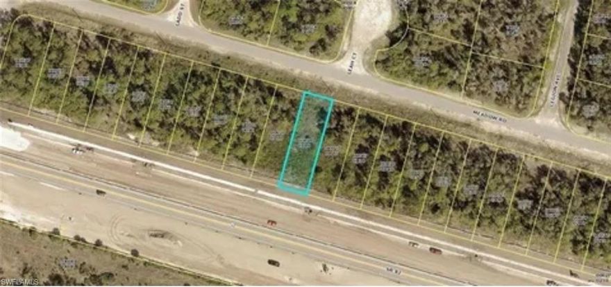 Unlock an exceptional commercial opportunity with this 8,751 sq ft (.20 acre) parcel located directly behind State Road 82, one of the fastest-growing commercial corridors in Lee County. This rectangular lot offers 50 feet of rear frontage on SR-82, providing excellent visibility and access for future business development.