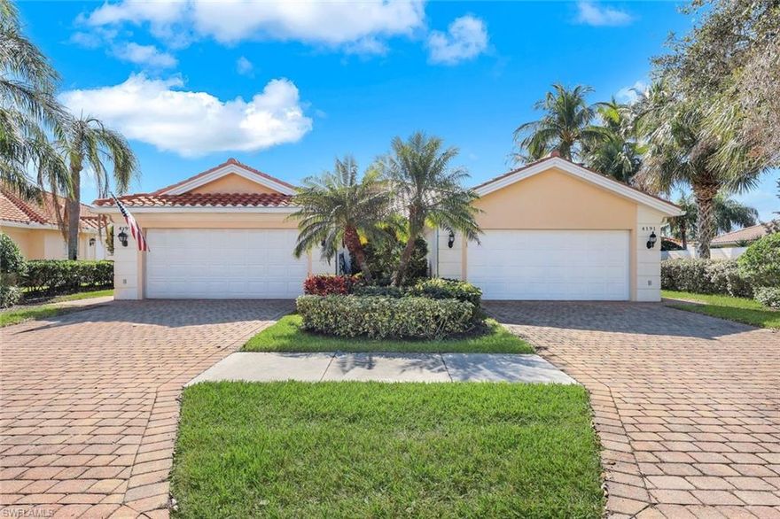 Welcome to 4195 Saint George Lane in Island Walk. Island Walk is a popular gated community located in North Naples and is only 7 miles from Vanderbilt Beach. This Capri Attached Villa offers 2 spacious bedrooms, 2 bathrooms, a 2-car attached garage, along with a private side entrance. Walking inside, you'll instantly notice the open concept floor plan with a spacious kitchen and Great room. Plus, right outside of your main living area, you have a large screened-in lanai with a privacy wall. Roof replaced in 2020. Outside of your front doors and within the gates, Island Walk is bustling with Activities and Amenities. There are miles of walkways and bridges for walking and biking, a resort style pool and a lap pool, a fitness center, tennis & pickleball courts, a restaurant, post office, gas station, bocce courts, car wash, beauty and nail salon and a putting green. There are many options for dining and entertainment that are just a short drive.