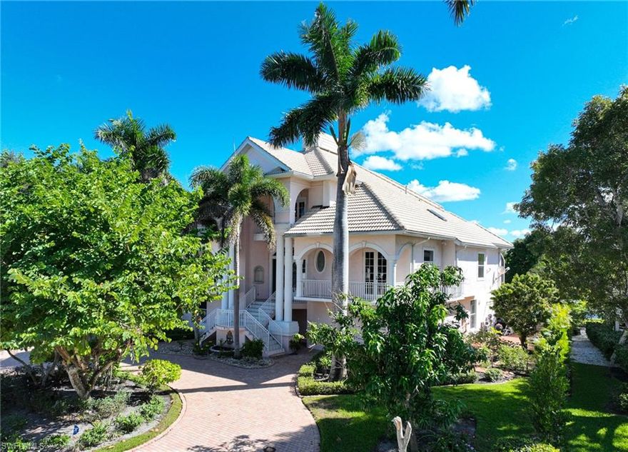 This one owner Barefoot Beach 6 bedroom/5-1/2 bath home is located in the double gated community of Southport on The Bay in convenient North Naples/Collier County.  It is situated on a large lakefront lot just a short walk to beautiful Barefoot Beach via a dedicated beach access and to your own boat dock & lift on the bay with direct Gulf of America access and no bridges.  This  home’s floor plan is perfect for large family gatherings and entertaining  and lilies on one level. Main living level has a large great room, dining room, in-eat kitchen, with direct  access to the large outdoor areas plus the master bedroom suite separate shower & bath, walk in closets, den/office, 2 guest bedrooms, and large storage areas. The 2nd floor offers guest bedrooms and baths.  There is a large walk-out to the landscaped yard and pool area that overlooks the lake and fountain.  There is a separate work area on the lower level, a 2 car garage and private elevator to all 3 levels.  The outdoor landscaping provides privacy surrounding the property and for your enjoyment of the pool, spa, and 2 story screened lanai. This home is in its original condition and ready for your to transform it into your own piece of paradise.  Nestled in Collier County’s gated Barefoot Beach community amenities include 24 hour guards and patrols.  Option to join the Club at Barefoot Beach (located in the community) which offers casual & fine dining restaurants, pool & beachside food, drinks, chair service, indoor & outdoor bars, ice cream & coffee shop, tennis courts with pro & a full events calendar. (waitlist with usage during wait period). Minutes to Mercato, Promenade & Waterside, the airports, dining, entertainment and golfing.