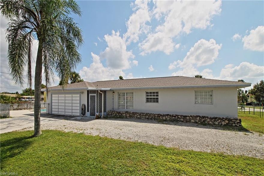 LOCATION & SPACIOUSNESS!!!  This single family home sits on TWO LOTS (120 ft. x120 ft.) and offers 4 bedrooms, 2 full baths, a den, an in-house laundry and large storage area.  The property boasts a below ground pool and a large 20 ft x 30 ft detached 3 car garage w/ storage situated on a fenced-in corner lot located close to award winning schools, 5th Avenue and downtown Naples, the best beaches, great shopping and delicious dining!   Topped with a new roof, as of March 4, 2018.   You can purchase this home being sold “As Is” with the right to inspect, TODAY!  Don’t let this opportunity slip through your fingers…call now for an appt.