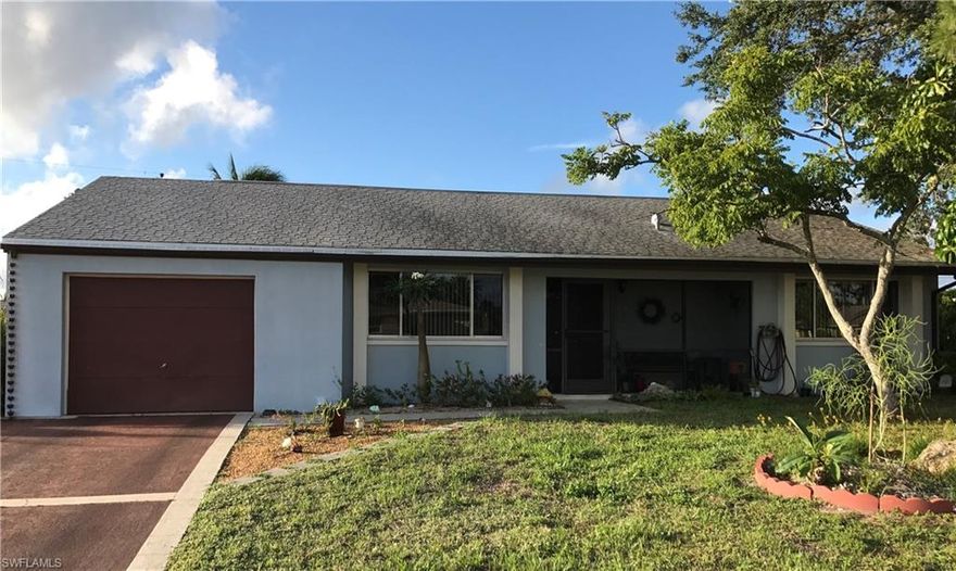 Southeast Cape Coral Country Club neighborhood and a short bike ride to downtown restaurants, shops and the Yacht Club Pier. This is a spacious 2 bedroom 2 bathroom home with a beautifully renovated kitchen. Large master bedroom with lots of light from the 8 foot picture window. Separate guest bedroom with it's own bathroom. French doors lead to an over-sized lanai that almost runs the length of the home and a yard with plenty of room for a pool. Owner widened driveway in 2008 and had maintained this home very well over the years.