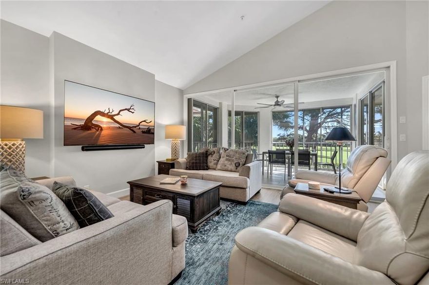 Unique and rarely available floorplan in Wedgewood in Bonita Bay. True four bedrooms, each with ensuite bath and custom closet. Soaring ceilings nearly 15 feet high in the main living area add fabulous light and spaciousness. Skylights in high ceiling add great light. No residence above you so very quiet. End unit with an extra wall of windows not found in interior units. Completely remodeled where almost everything was replaced. All kitchen and laundry cabinets replaced, all bath vanities replaced, white quartz countertops in kitchen and all vanities. All floors replaced, all appliances replaced (all LG), all plumbing toilets and faucets replaced, new doors, new closet doors, custom closets. Wonderful laundry room w/big LG washer/dryer and laundry sink and pullout pantry. Additionally, the property comes with an enclosed 2 car garage that did not flood. It also has a storage closet on the walkway outside the front door and another private closet on the 4th floor with HVAC and extra space. Oversized primary bedroom with desk overlooking the golf course. Incredible walk-in shower in primary bath. All tempered glass shower stalls and doors. Huge walk in shower in bath 2 as well. Take the steps or use the elevator up to the third floor. The lanai is screened-in, and glass enclosed and stays perfectly warm or cool during all seasons. The view is overlooking 2 golf fairways and a lake. Extremely quiet, “tucked away” location in Wedgewood. Huge Wedgewood pool is steps away. Wedgewood also has 2 tennis courts for residents of Wedgewood. The bus stop to the beach is right at the front entrance to Wedgewood. Incredible value for a remodeled 4-bedroom and 4-bath in Bonita Bay. Great location 1 stop sign from the gate. Sold turnkey furnished.