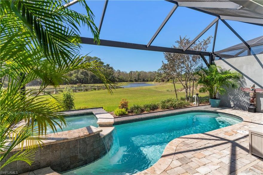 You have hit the trifecta with the most popular floor plan situated on an absolutely incredible home-site in the most desirable community, The Isles of Collier Preserve. This Dahlia pool home is loaded with beautiful upgrades. You will love how everything harmonizes and flows together. Neutral tones and beautiful plantation shutters throughout. The coiffured ceilings with crown molding show off the high ceilings. Relax in your pool while enjoying the breathtaking, private lake and preserve view through the picture frame screen. Enjoy another beautiful Florida sunset while sipping your favorite beverage in your private spa. The Naples lifestyle continues with the amazing amenities, which include an Old Florida style clubhouse with a state-of-the-art fitness center, both a resort and lap pool, walking and biking trails along the tranquil Cypress Waterway, tennis and pickleball courts, bocce and more. Meet your neighbors for happy hour or a delicious meal at the Isles private Overlook Bar & Grill restaurant. Don’t miss out on the opportunity to make this jewel your home.