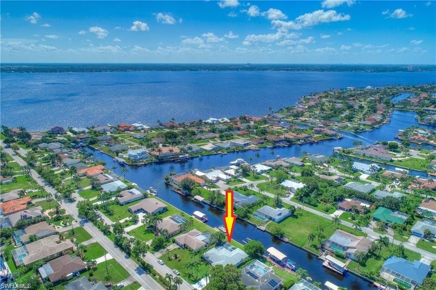 Direct sailboat gulf access pool home with no bridges to the river. This waterfront pool home features over 2,000 square feet of living space under AC with 4 bedrooms and 2 baths and an attached two-car garage. The home is light and bright with an updated kitchen that overlooks the pool area. The large screened lanai has both covered and uncovered areas perfect to enjoy the outdoors rain or shine with plenty of room to BBQ and entertain. The floor plan offers an owner flexibility with the layout as there are two main living areas perfect for entertaining or privacy. Diagonal tile flooring throughout all the main living areas and new carpeting in the bedrooms. New concrete seawall. On city water and sewer with all assessments paid. Fantastic location just 2 minutes to the river by boat. Conveniently located in the desirable neighborhood of Cornwallis close to shopping, dining, entertainment with easy access to Fort Myers.