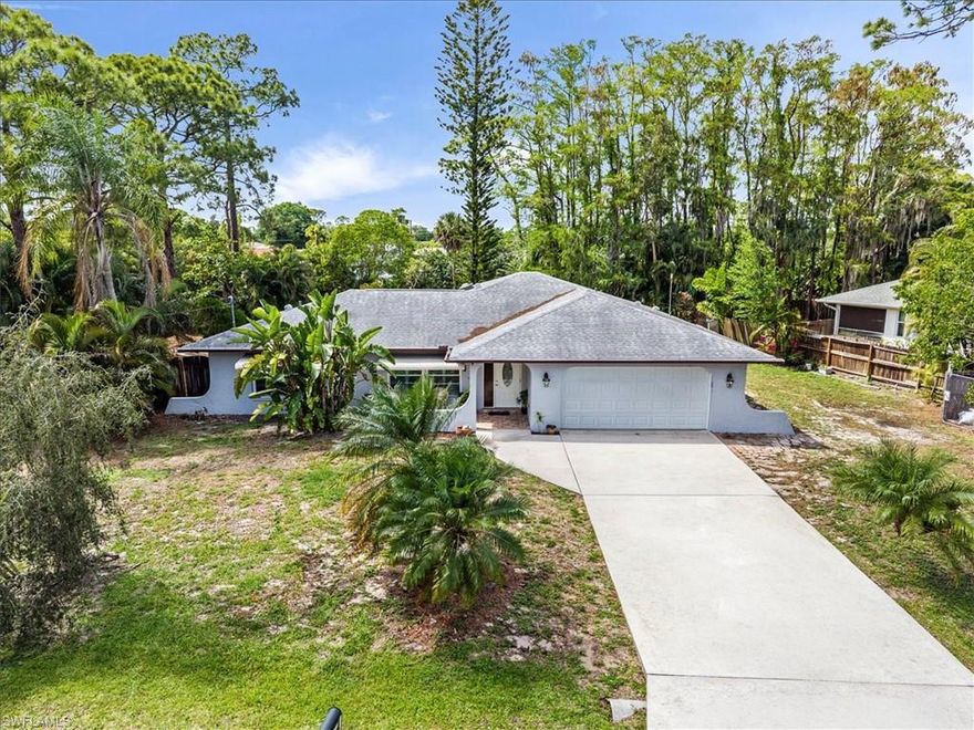Experience the rare space and privacy on this massive triple lot in San Carlos Park.  This solid concrete-block home at 19208 Murcott Dr E features a bright, open-concept layout with fresh, modern paint. The kitchen shines with new countertops and stainless steel appliances, while the master suite offers a fully renovated, contemporary walk-in shower (2025).
Designed for peace of mind and flexibility, the home sits high and dry in a Preferred Non-Flood Zone (X) with NO HOA fees, and CITY WATER.  Major systems are recently updated, including a 2024 water heater, 2019 HVAC, Front Hurricane impact windows (2025), and 2017 roof. Two oversized living areas provide the perfect footprint for a home office or media room, while the private lanai serves as your front-row seat to Southwest Florida’s stunning sunsets.
The sprawling backyard is a true blank canvas with drive-through access on both sides, perfect for boat or RV storage, a resort-style pool, or a detached workshop. You are perfectly positioned less than 5 minutes from Coconut Point, Gulf Coast Town Center, and Miromar Outlets, with rapid access to RSW Airport and top-rated schools. Whether you're looking for a private sanctuary or a high-yield investment, this triple-lot gem is a standout opportunity in today's market. Schedule your tour today!