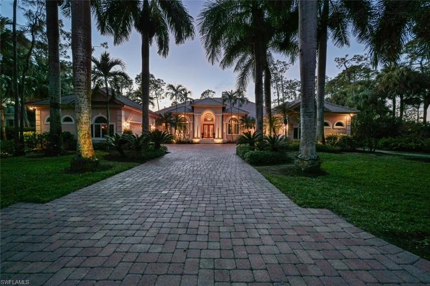 Entertain your friends and relax with your family in this custom built, well maintained estate home with new roof.  Featuring 4 spacious en-suite bedrooms, plus full powder bath with access to the pool, office with exquisite built in cabinetry, 3 car attached garage and separate 2 car air-conditioned garage built to accommodate 4 cars with car lifts.  This exceptional home features a gourmet kitchen with gas stove, island prep sink, warming oven and 2 pantries.  The exceptional family room is sized for entertaining all of your guest.  The oversized lanai goes the length of the home with honed Turkish marble flooring, gas heated pool and spa, with well equipped outdoor kitchen.  Sunlight streams through this home with its large windows and sliding glass doors.  Enjoy the sunset with long lake and golf course views looking down the 6th hole of the Pine golf course.  This cul de sac homesite is just under an acre offering complete privacy from other homes.