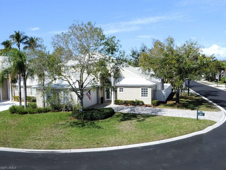 Completely remodeled and well maintained Camellia model home in Tavernier. Well priced upgraded home and absolutely move-in ready. This home sits on a nice corner lot with 3 bedrooms, 2 ½ baths, 2 car garage, great room, large kitchen, and within walking distance to Club house/tennis courts/pool/fitness center. This home has all new flooring and tile throughout. Kitchen completely remodeled several years ago with granite, wood cabinets, new LG stainless appliances. All bathrooms remodeled with granite counters and new vanities. Crown molding throughout the home, custom wood cornices atop the windows, all new lighting fixtures throughout including LED recessed lighting. This home has a large driveway with newly installed custom pavers. The covered lanai has custom wood ceilings and the patio area was extended with custom paving work to create a terrific outdoor entertaining space. New hurricane impact front doors installed 2017, and new A/C system installed in 2016. Exceptional North Naples location within minutes to beaches, golfing, convenient to shopping centers, restaurants and close to Airport.  An outdoor above ground hot tub/spa installed 2016 is negotiable.