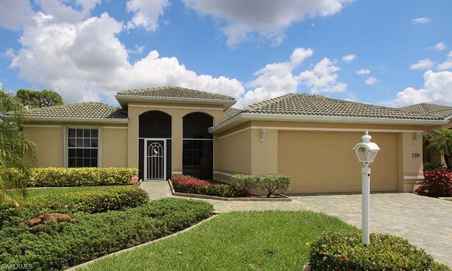 FABULOUS EAGLE model home with SOLAR HEATED SALTWATER POOL AND SPA overlooking the GOLF COURSE on the 16th FAIRWAY.  This unique home features 3 bedrooms, 2.5 baths; paver drive, sidewalk and pool deck; screened loggia; accordion shutters; newer appliances; A/C replaced in 2013 and cage area has just been rescreened plus cage structure reinforced.  The interior floors have been upgraded to gorgeous diagonally laid, high quality laminate in all rooms except the guest bedroom which is carpeted. This home offers plenty of space to entertain family and friends on your screened lanai and pool deck, watching the golfers go by or inside the spacious living/great room areas.  Come enjoy all there is to offer in Herons Glen where the residents own the facilities and the amenities are abundant:  Bocce, Pickle Ball, Shuffleboard; Tennis; Clubhouse, Restaurant/Lounge, Pool/Spa; Exercise Facility; Libraries; Hobby Rooms and many planned activities.  Call Today!