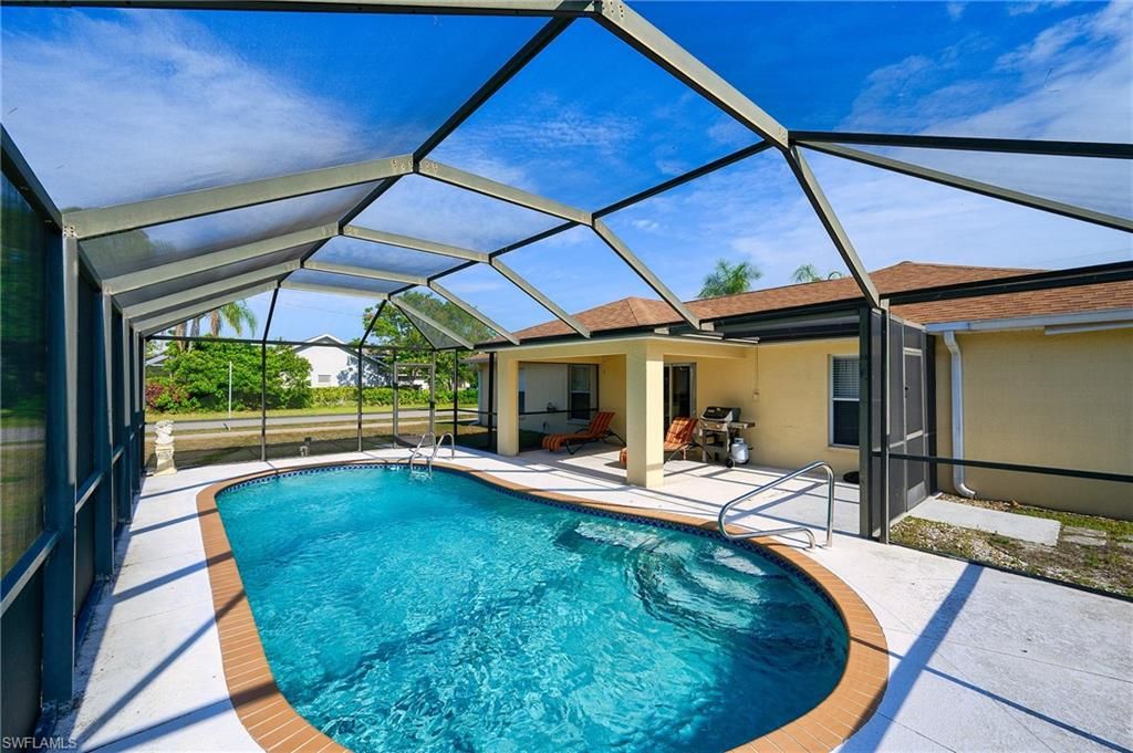 Photo of 2519 6th ST W, LEHIGH ACRES, FL 33971 (MLS # 226017831)