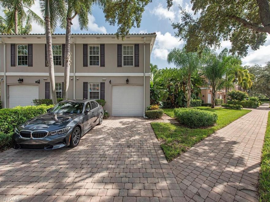H.16311 - THE COVE IN NORTH NAPLES ~ DIVOSTA built End Unit, 3 BR/2.5 BA one of a kind pool home! This is the ONLY unit in The Cove community with its own private brick paver courtyard adjacent to your private pool and screened lanai.  Outdoor space and privacy abounds. The charming courtyard, complete with accent lighting and landscaping is the perfect space for relaxing, entertaining and outdoor dining.  Light, bright and in pristine condition, this townhome is situated on an oversized corner lot with a side yard for kids, pets and enhanced privacy.  The first floor living area offers an open floor plan with a great room, kitchen with newer refrigerator, microwave and stove, dining area, half bath, laundry room, and a one car attached garage.  The second floor includes three bedrooms and two full baths.  The large master suite offers two closets, a walk in shower, soaking tub and double sinks. LOW HOA FEES and conveniently located in North Naples, close to shopping, dining, and Mercato.
