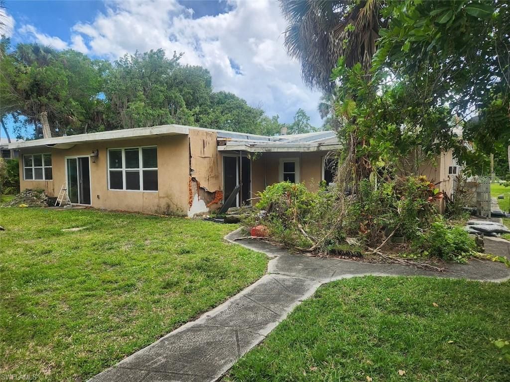 Photo of 1074 Old Bridge RD, NORTH FORT MYERS, FL 33917 (MLS # 226017636)