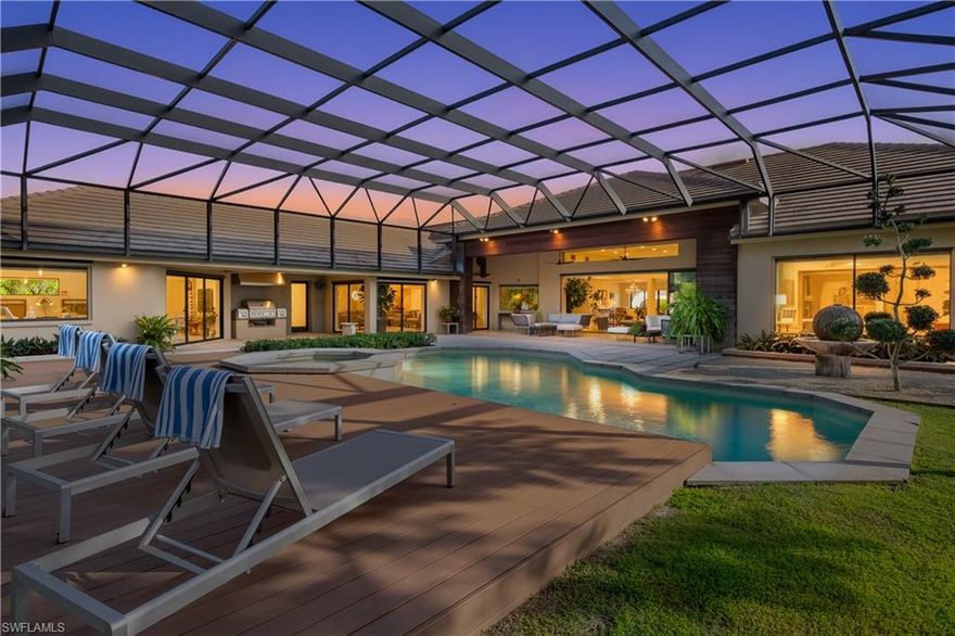 This home is like a thoughtfully commissioned work of art, as unique as its deserving new owner. Welcome to Pelican Bay’s most coveted estate compound. With midcentury modern, Asian and Frank Lloyd Wright inspired architecture, this home sits on one of the largest and most secluded lots ever to become available. At the end of a quiet cul-de-sac, bordering Oakmont Park, enveloped by a one-tenth of a mile long, 10-foot tall Clusia privacy hedge, arriving home at 705 feels like a welcome respite from the hectic, outside world. This is your own one-of-a-kind sanctuary. A master class in good taste and modern, elegant design, this sprawling 10,000+ sf residence has
been architecturally upgraded with every high-end convenience, always with gracious entertaining
top-of-mind. In addition to countless large family celebrations, this home has been chosen to host
some of Naples’ most prestigious society gatherings including the Artis Naples Annual Art Tours,
Food & Wine Celebrity Chef Galas and Humane Society Annual Benefits, to name but a few.
Meticulously maintained with 5 large bedrooms, all with modern, en suite baths. The two principal suites each feature private courtyards and gardens. The very large Cabana Suite overlooks the
stunning pool area and zen garden - it feels like a treehouse! Another bedroom suite features its
own orchid house and screened courtyard. A gigantic, double-height lanai overlooks wooded
Oakmont Park and offers the utmost in luxurious indoor/outdoor living. Other notable amenities
include a state-of-the-art Dolby theater, home chapel, steam shower, outdoor shower, commercial
outdoor kitchen, storage/catering rooms, 5 attics, a collection of exotic fruit trees, etc.
This home has had a joyous (and auspicious) past and now looks to continue that tradition,
elevating the lives of its fortunate new owners.