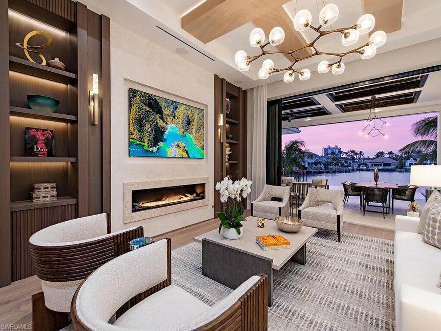 This magnificent New Construction waterfront residence represents the best value in Park Shore! Stunning! It boasts 70 ft on the bay encompassing over 6,019 sq ft under air and 8,106 sq ft overall with the highest finishes and furnishings to appease the most discerning buyer. The home was penned by the highly acclaimed MHK Architectural Firm, meticulously built by T.B. Price, and thoughtfully designed and curated by Lisa Ficarra of Ficarra Design Associates, all renowned for their exceptional design and craftsmanship. The residence INCLUDES over a 1 million dollar furniture package as well as a Loxone home automation system! You have 6 en-suites including the primary suite overlooking the glistening bay, a gracious spa like primary bath, spectacular office with a wet bar, elevator, Gourmet kitchen, Sub Zero/ Wolf appliances, wine room, catering kitchen, outdoor kitchen, upstairs morning and evening bar, multiple gathering areas, 4-85 inch TV’s, indoor/outdoor surround sound, Legno Bastone flooring, automated shades throughout, 3 car garage that accommodate 3 lifts to hold 6 cars, pool w/sun shelf, spa, pool bath, full house generator. The water frontage can hold up to a 50ft boat as well!