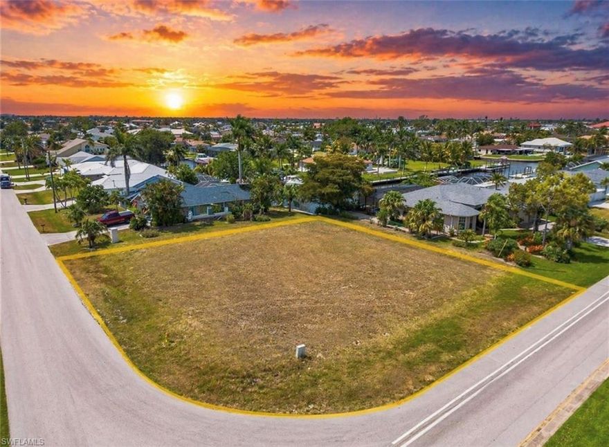Prime oversized corner lot in highly desirable SE Cape Coral, offering the perfect blend of location, lifestyle, and opportunity. Just moments from the public boat ramp at Herman Horton Memorial Park, enjoy quick, convenient access to the Caloosahatchee River and out to the Gulf of Mexico—ideal for boating enthusiasts and those seeking the Southwest Florida waterfront lifestyle.

This rare corner parcel is nestled within an established neighborhood and features water views of the Hudson Canal from the rear, adding to its appeal and future home potential. Conveniently located near Del Prado Blvd and Veterans Parkway, providing easy access to shopping, dining, and the Midpoint Bridge for quick connections to Fort Myers.

Whether you’re looking to build your dream home or invest in one of Cape Coral’s most sought-after areas, this property presents an exceptional opportunity with location and lifestyle to match.