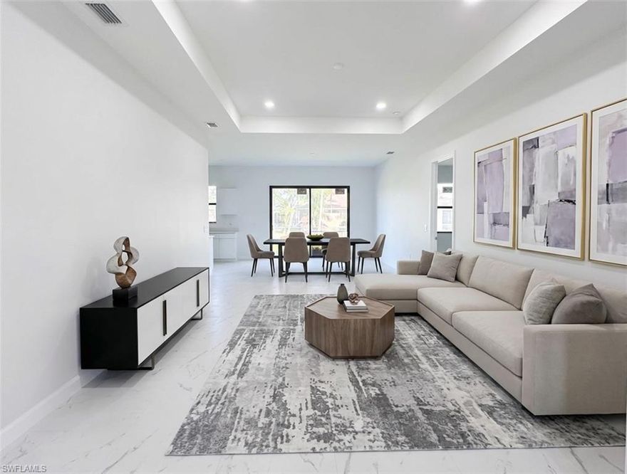 Step into stylish, low-maintenance living in this thoughtfully designed home situated in a sought-after 
neighborhood. The bright and airy open layout is enhanced by soaring ceilings and abundant natural light, creating an inviting space perfect for both relaxing and entertaining. With 4 bedrooms and 3 bathrooms arranged in a split floor plan, privacy and comfort are seamlessly combined. 

The contemporary kitchen stands out with elegant quartz countertops, modern cabinetry, and stainless steel appliances, flowing effortlessly into the main living areas. The spacious primary suite serves as a private retreat, complete with a walk-in closet, dual sinks, and a sleek glass-enclosed shower. Throughout the home, tile flooring adds durability and style, while impact windows provide peace of mind. 

Enjoy outdoor living in the covered patio overlooking a fully fenced backyard—ideal for gatherings or quiet evenings. A two-car garage, paved driveway, add everyday convenience. Perfectly positioned close to shopping, dining, and local amenities, this home offers both comfort and accessibility. 

Don't miss the opportunity to make it yours—schedule a showing today!