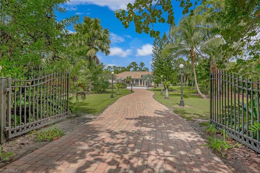 This is your opportunity to purchase in Livingston Woods!  Elegant single family residence in this sought after community is ready for a new owner with 2.5 acres, privacy and peacefulness with the convenience of being in town. This well laid out home consists of 4,700SF, 4 bedrooms, 4 baths, a large office and 2 smaller bonus spaces, soaring ceilings and a completely fenced back yard.  The scenic, gated property consists of vast, beautifully landscaped grounds and expansive outdoor living areas complete with inviting pool and spa with water features. Livingston Woods is a unique community conveniently located just minutes from the Waterside Shops, Ritz Carlton, Mercato and only a short drive to downtown Naples’ white sand beaches, fine dining and world-class shopping.