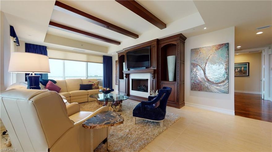 C.17488 -This turnkey furnished 01 unit is a rare find at Tavira.  Beautiful views of the Estero Bay and Bay Island #10. A screened west facing terrace has an electric grill and hurricane shutters. Features include 3 BRS + den, 4 full baths, new counter tops in the kitchen, all recently painted, extra closets, custom built-in den, gas fireplace & stove top, well designed custom closets, private elevator entry, private enclosed over sized 2 car garage & air-conditioned storage. Tavira has a fitness center, theater, billiard room, pool & spa with gas grills, screened poolside cabana with bar & fireplace, golf training room, 2 guest suites, full-time resident manager, newly redecorated common areas.  Bonita Bay has 5 golf courses, 18 court tennis center, 18,000 sf. fitness center, 8,000 sf. Lifestyle spa & salon, full-service marina, Gulf front beach park, 6 restaurants, 8 pickleball courts, crochet, bocce ball, canoeing, life enrichment center, 3 parks, & much more.