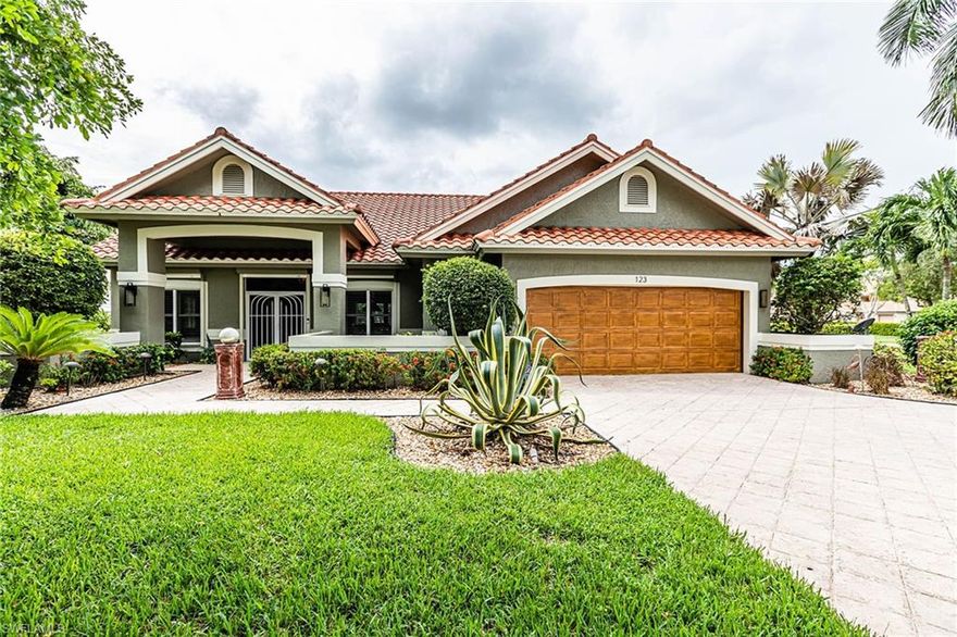 Come to Port of the Islands for peace and tranquility. This low-density area is the perfect place to boat and fish. Beautifully updated home with soaring ceilings and upgraded features. Impact windows and doors as well as electric hurricane shutters offer you safety from the weather. A nice open view of the bay with access out to the Gulf is a plus. Large corner lot with circular drive. Freshly painted inside and out. New composite dock with understructure for stability with 10,000 lb lift and stainless steel fish cleaning table. Privacy fence and aluminum fence around a gas heated pool and spa courtyard. Built-in gas grill with downdraft to outside. Many updated features include granite countertops in the kitchen and bathrooms with appliances under two years old. 18x18 tile throughout. Custom walk-in closets with cherry cabinets and onyx countertops. Plantation shutters and custom window treatments. Oversized two-car garage with lots of storage.