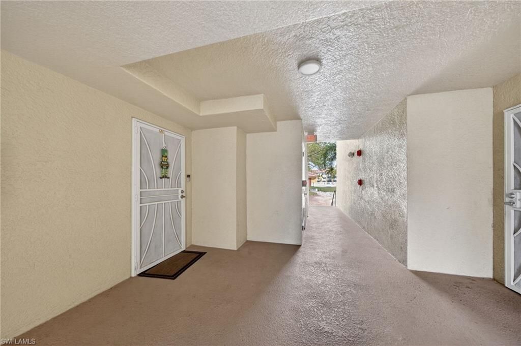 Photo of 4135 Residence DR #602, FORT MYERS, FL 33901 (MLS # 226012898)