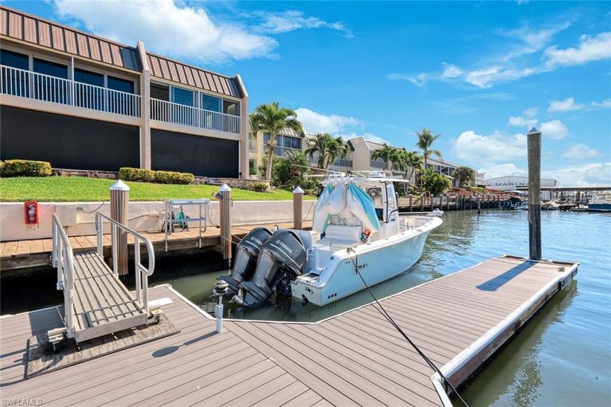 Available as a turnkey furnished waterfront rental with a 30-day minimum stay or annual lease, this remodeled residence at the exclusive Naples Bay Club offers breathtaking long water views, direct bayfront living, and a rare private 32’ floating BOAT SLIP with no-bridge Gulf access. This refreshingly modern 2-bedroom, 2.5-bath townhome is completely rebuilt, move-in ready, and ideally located just minutes from 5th Avenue South and one mile to Naples’ white-sand beaches.

Designed for refined coastal living, the residence features hurricane-impact windows and doors, 10-inch bleached oak flooring, and a chef’s kitchen with Bosch stainless steel appliances, induction cooking, custom Eric Baker cabinetry, and Taj Mahal Quartzite countertops. Spa-like baths include large-format porcelain tile and Kohler fixtures.

Enjoy nightly sunsets, panoramic bay views, and Naples Pier fireworks from your private waterfront deck. The included boat slip accommodates vessels up to 32’ with electric and water service, providing immediate access to the Gulf with no waiting.

Community amenities include a heated waterfront pool, covered outdoor kitchen and bar, dressing rooms, covered parking, ample guest parking, and a walkable location near Tin City, Bayfront, and downtown Naples. Optional membership at Naples Bay Resort offers pools, spa, fitness center, tennis, and waterfront dining.

Exceptional waterfront rental opportunity. Turnkey. Rare. Direct bayfront.