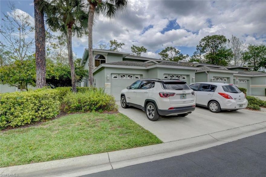 PRICE REDUCED BECAUSE THE OWNER SAYS SELL! This First Floor Lakefront 2 Bedroom Plus Den 2 Bathroom Unit has Wood Plank Tile Flooring throughout. It has Granite Kitchen Counters and upgraded Hardware on the Cabinets.  This unit is nicely furnished with a tranquil view of the lake.  It also has both electric and Accordion shutters.  This Community has walking/biking trails around Berkshire and Belville Lake, a fishing Pier, Tennis Courts, Lakeside Pools, and is only located a couple of minutes to Berkshire Commons Shopping Center. You are located approximately 15 minutes to downtown Naples.
The Detached Garage is only a few steps from your front door.  There are 9 guest parking spots within 75 feet of your front door in case you like to entertain.