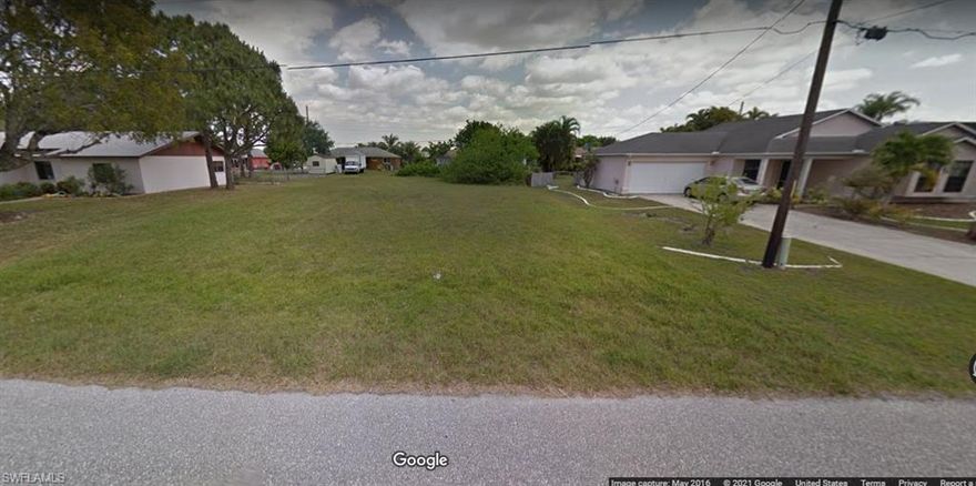 Location Location Location! Build your dream home today. This home located in the prime area of SE Cape Coral. Surrounded by single family homes, in a quiet developed neighborhood. Minutes from Sunsplash, shopping center, grocery store, community park, Gym, and golf course .