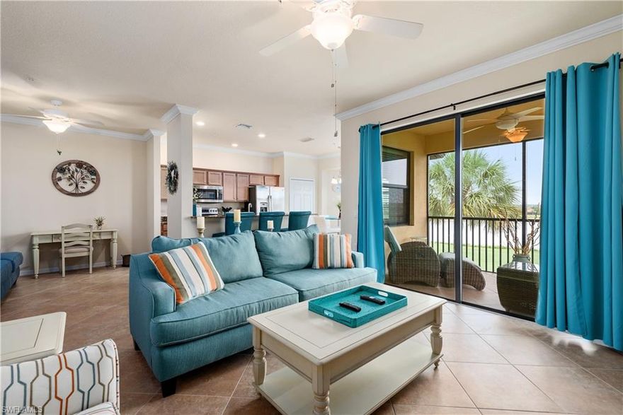 This is the one you have been waiting for .. This home has it all.
views....views....views.... Fantastic Western exposure for beautiful sunsets !!!
wide lake and golf course views...top penthouse floor...Very desirable end unit,  Bellini Floorplan ..
no-se-um screen added to lanai for your outdoor comfort.
stainless steel appliances, upgraded kitchen cabinets, granite counter tops, full golf membership 
large outside storage closet. prime parking spot by entrance. comes turnkey with nice Florida coastal feel furniture and accessories.   Don't miss this opportunity this is one of the most desirable homes in the building!

community features guard gated security, golf, tennis, resort pool , restaurant, pool bar, driving range, fitness center, spa, locker rooms, formal dining clubhouse, and more.  this community has it all for the lifestyle buyer. excellent location, close to beach, shopping, restaurants, i-75, and airport.