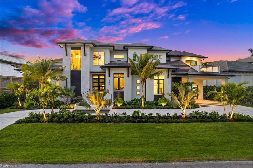 Live the Ultimate Olde Naples Lifestyle. Located just off the iconic Gordon Drive, this newly constructed 2024 masterpiece offers the best of coastal living—direct beach access right across the street and a short stroll to the renowned dining, shopping, and charm of Third Street South. Nestled on a private homesite, this 5-bedroom + study, 5.5-bath home combines exceptional craftsmanship with timeless elegance, creating a sanctuary where luxury meets lifestyle. Every inch of this residence reflects meticulous attention to detail, from the warm wood tones and chic blue accents to the sun-filled interiors and finest designer finishes. Entertain effortlessly with a gas-heated pool and spa featuring cascading water features and fire pits, while an outdoor kitchen and fireplace invite al fresco dining under the stars. Inside, the open kitchen and butler’s pantry are a chef’s dream, complete with a 100-bottle wine cooler and a “hidden” walk in pantry found behind custom cabinet doors. The kitchen and great room create a seamless space for hosting guests for elegant dining or a casual watch party. A Lutron lighting system sets the mood throughout, while an elevator adds ease to daily living—accessing each level from the garage to both levels of the living areas. A generator provides additional piece of mind in addition to the fact that this newly constructed home meets the current codes for storm protection. Guests will be excited to unwind upstairs in the family room, with bar, or retreat to a private wing featuring its own bedroom, bath, living room, breakfast bar and balcony. Each bedroom includes a walk-in closet with custom storage, and the expansive second-floor balconies allow ideal for your guests to enjoy outdoor space right off their bedroom or the upstairs family room.
This residence is more than a home—it’s a refined coastal retreat with proximity to the very best of Olde Naples living.