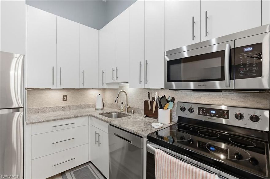 Discover easy Florida living in this beautifully renovated 3-bedroom, 2-bath condo located in the gated community of Summerlin Woods. Bright, open, and airy, this home features tall ceilings, spacious rooms, and stylish modern updates throughout.

The stunning updated kitchen is a standout, complete with new Samsung appliances, tall beautiful white cabinets, long stainless steel pulls, granite countertops, and an elegant ceramic tile backsplash—perfect for cooking and entertaining. Both the primary and guest bathrooms have been thoughtfully updated, offering a fresh, contemporary feel. The master bath also features custom sconces, new his/hers medicine cabinets and white shiplap surround. The generous primary suite also includes a large walk-in closet for plenty of storage.

Step outside to your private screened-in lanai, an ideal spot to enjoy morning coffee, relax with a book, or unwind after a day at the beach.

Location is everything, and this condo delivers. Just minutes from beautiful Gulf beaches, shopping, dining, and the airport, and only a short walk to Lakes Regional Park, where you can enjoy trails, nature, and the popular Wednesday farmers market. You're also close to the charm of Sanibel Island and vibrant Fort Myers.

Residents enjoy fantastic amenities including a large community pool, tennis courts, and pickleball. Even better, the low HOA fees of just $1,681 per quarter and flexible rental policy (up to 4 leases per year with a 90-day minimum) make this a great option for seasonal living, full-time residence, or investment potential.

Move-in ready, beautifully updated, and perfectly located—this is Southwest Florida living at its best.