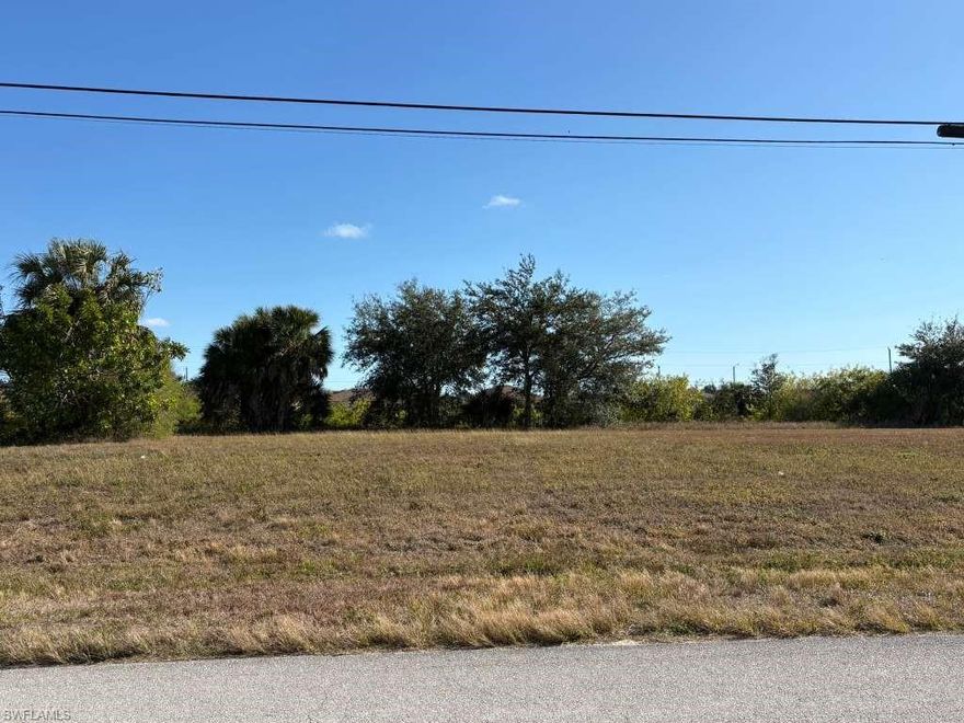 This prime residential buildable lot with a canal at the rear of the property is located in a rapidly growing area of Cape Coral, surrounded by new construction and well-maintained neighborhoods. Perfect for building your primary residence or custom dream home.

The property is conveniently located near top-rated schools, including Diplomat Elementary School, Mariner Middle and High School, making it an excellent choice for families.

Enjoy the many benefits of living in Cape Coral, known for its clean, planned layout, wide streets, extensive canal system, and relaxed Florida lifestyle. Residents enjoy proximity to parks, shopping centers, dining, golf courses, and quick access to major roads. Cape Coral also offers easy access to Fort Myers, Southwest Florida International Airport, and the beautiful Gulf Coast beaches.

This lot provides ample space to design a custom home with room for outdoor living, a pool, and entertaining areas. A great opportunity to build in one of Southwest Florida’s most desirable and fast-growing communities.