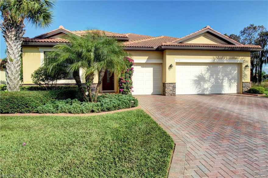 Immaculate 4 bedroom 3 bath 3 car garage lakefront pool home in Hampton Park.  This home built in 2011 boasts almost 2300sf of living area situated on a lakefront lot next to the preserve!  This home has a huge kitchen with granite countertops, island and stainless appliances.  Spacious living areas with tile, crown molding, high ceilings, generous master bedroom and bathroom with tub, enormous outdoor living space with pool and spa, lush landscaping, Low HOA fees, underground utilities, close to restaurants, schools, shopping, SWFL Regional Airport, FGCU, Jet blue park  and so much more.  Pride of ownership shows in this home, bring your most meticulous buyers!!