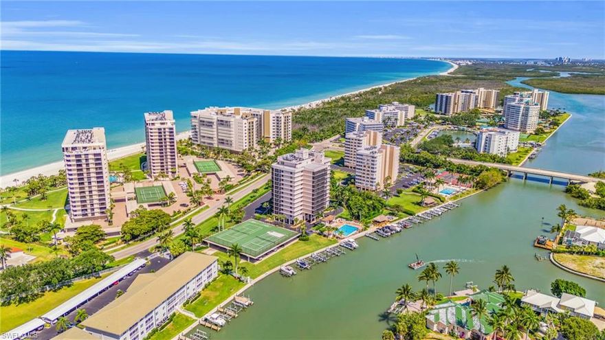 Step into a world where luxury and nature converge, offering an unparalleled living experience. This 7th-floor, 2-bedroom, 2-bath condo is more than just a residence; it’s a tranquil sanctuary with breathtaking views of Vanderbilt Bay and the Gulf of Mexico. Imagine sipping your morning coffee as the sun rises over the bay or unwinding with a glass of wine while the Gulf’s stunning sunsets paint the sky, all from the comfort of your private balcony. Elegantly Updated & Move-In Ready: This pristine unit has been thoughtfully updated with fresh, chic paint and brand-new flooring, setting the perfect stage for you to personalize and make it your own. The open living area is awash in natural light, highlighting the spacious layout and accentuating the serene coastal ambiance. Each bedroom serves as a cozy retreat, complete with large windows that frame the picturesque seascape, offering a daily invitation to soak in the beauty of Naples’ iconic shoreline: A Lifestyle of Luxury & Convenience: Located in the exclusive, gated community of Vanderbilt Yacht & Racquet Club, this residence is designed for those who seek the best of both worlds—relaxation and recreation. Enjoy private beach access just across the street, or take advantage of leasing a boat dock with indirect Gulf access for endless days of nautical adventure. If tennis or pickleball is your game, the on-site courts are waiting for your next match. Or, perhaps you’ll opt for a peaceful paddle on the bay or a workout in the well-appointed fitness center: Resort-Style Amenities Await: Indulge in the resort-style amenities, including a stunning bayside pool complete with a Tiki Hut, BBQ grills, and a fire pit area—perfect for evening gatherings under the stars. Host family and friends at the community clubhouse, or simply relax and enjoy the meticulously maintained grounds, all under the attentive care of the dedicated on-site manager: Premier Naples Location: Positioned just a stone’s throw from the pristine sands of Vanderbilt Beach, you’re perfectly placed to enjoy all that Naples has to offer. Stroll to nearby world-class dining establishments like LaPlaya and The Turtle Club, or explore the upscale shops, restaurants, and vibrant nightlife at Mercato. Everything you need for the perfect coastal lifestyle is within reach: 
Turnkey Furnished & Ready for You: This immaculate condo comes fully furnished and turnkey—just bring your suitcase and start living the Naples dream! With deeded covered parking, convenience and ease of living are assured. Don’t miss this opportunity to experience the ultimate in coastal elegance and sophistication. Schedule your private showing today and take the first step toward making this extraordinary retreat your very own. Welcome home!