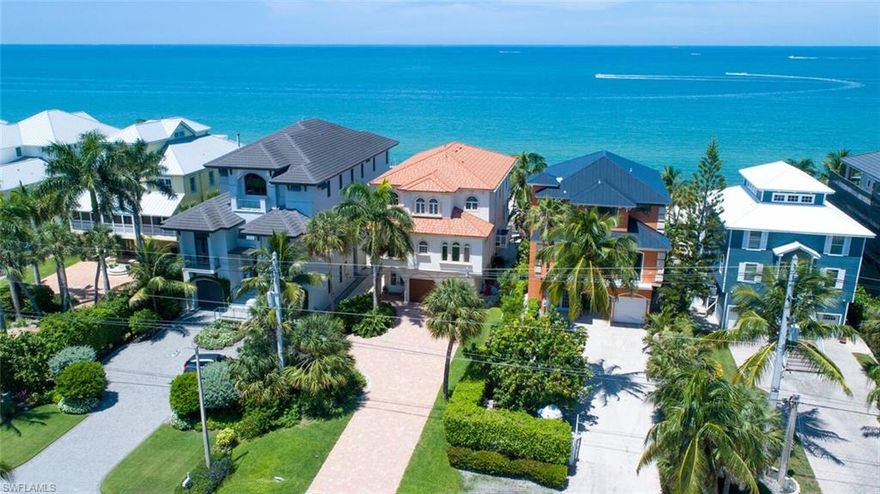 DIRECT BEACHFRONT, POOL HOME FINALLY AVAILABLE ON BONITA BEACH! CURRENTLY THE ONLY BEACHFRONT HOME FOR SALE ON THE ISLAND! This spacious & bright 4 bed, 4 bath home features an open floor plan that perfectly highlights the beachfront setting. Enjoy panoramic Gulf of Mexico views from multiple balconies overlooking the crystal turquoise waters.  Fully pocketing sliders on the main level allow for seamless indoor/outdoor beachfront living. The massive master bedroom features a private balcony, elegant tray ceilings, office with wet bar & large bathroom with huge walk-in shower, deep jacuzzi tub & dual-vanities.  The open kitchen boasts professional grade appliances, granite counters & incredible Gulf views.  Features a private elevator, NEW pool & spa in 2014, NEW roof in 2018 & NEW HVAC added in 2021.  This perfectly located home is ready for you to add your touch to make it your perfect dream home on the beach. INCREDIBLE RENTAL INVESTMENT OPPORTUNITY WITH NO RENTAL RESTRICTIONS! Ideally located minutes to Mercato & North Naples’ amenities with easy access to I75 & the International Airport. Enjoy the best of the best; all overlooking the stunning Gulf of Mexico.