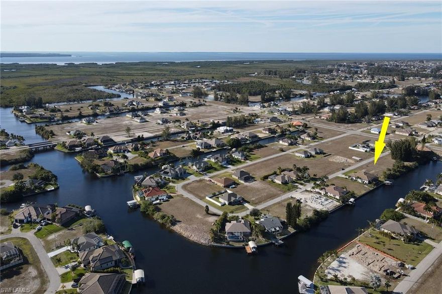 This Eastern Rear Exposure, Gulf Access property is Conveniently Located in NW Cape near the North Spreader Canal to access Matlacha Pass and the Open Waters of Pine Island Sound. From Pine Island Sound you can boat to Sanibel, Captiva, North Captiva, Fort Myers Beach, Useppa, Cayo Costa and the Gulf of Mexico. Go fishing right in your own back yard or head to Matlacha for amazing waterfront restaurants, delicious seafood, and lots of live entertainment. This property is only 19 miles from The Punta Gorda Airport and 30 miles to Fort Myers' RSW Airport. Great location to build your dream home or invest with this being one of the fastest growing areas with newer homes in Lee County!