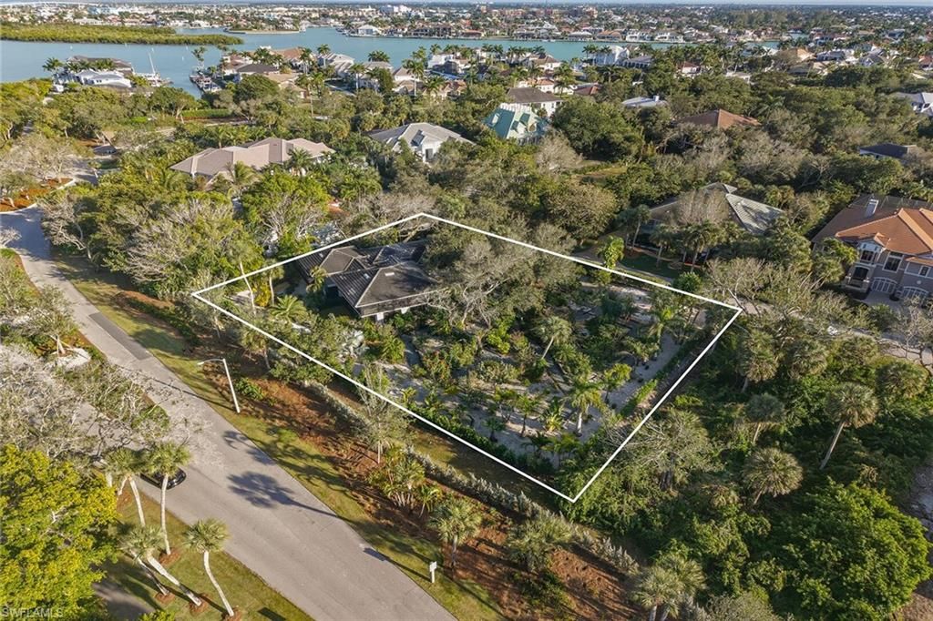 Photo of 386 Live Oak LN, MARCO ISLAND, FL 34145 (MLS # 226004802)
