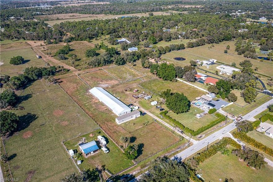 PRICE IMPROVED & ready to SELL. This 10+ Acre Horse Farm is a rare find for equestrian enthusiasts or those seeking land/space for their business.  The working horse farm is fully fenced for boarding and is ideally situated close to I-75.  Not in a flood zone and no flooding or hurricane damage.  The 2022 Manufactured home is 2-bedroom, 2-bathroom with handicap access. The property also features a 24-stall metal barn equipped with a workshop, tack room, storage areas & bathroom, offering endless possibilities for customization to suit your needs. Roof (2022), AC (2022), Water Heater (2022), Septic (2022), New well pump & pressure tank.  Whether you’re looking to create the ultimate horse farm, a private estate, or something entirely different, don’t miss the opportunity to make this exceptional property your own!