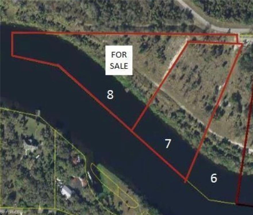 Expansive intercoastal 3.19 acre homesite with 440+ feet on the Caloosahatchee River with southwest exposure!  Enjoy beautiful sunsets from your back porch or balcony.  This unique homesite allows one horse or cow per acre.  There is plenty of room for an oversized garage, workshop and barn to store your toys!  Enjoy gardening, kids, animals, and the peace of living on the water.  Build a dock with yacht pilings or a lift, and get the most out of boating, whether it’s down the river or out to the Gulf.   Included is a private road for joggers, runners, biking, etc., including security gate.   Also enjoy the beauty of 185 acres of the surrounding City of LaBelle Nature Recreation Park, including deer, birds of all species, wild hogs, and raccoons.  You can have it all here with the best of nature, plenty of space, privacy and the luxury of waterfront living.