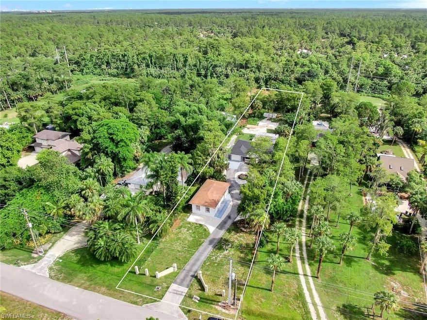 Prime Location!!! Golden Gate Estates West of CR-951 (Collier Blvd) off of Green Blvd.  This wonderful   open concept & contemporary Single Family Home is on a 1.14 acres of land, completely renovated,  features nearly  1,900 Sq. Ft of living space, 3  bedroom,  2 Full  new bathrooms with granite, formal dining room, Florida room, 1 car garage. Freshly painted inside and out, new kitchen with self-close cabinets, granite, kitchen island with more storage, new stainless steel appliances, new glass back splash, new doors, new crown molding, new based boards,  new  AC system, newer roof 2017,  new light fixtures, new plumbing, new smoke detectors, new tank-less water heater Rheem, new well equipment. Home is equipped with 7 security cameras (Night Owl System) also there is  warehouse with  nearly 800 Sq. Ft under air with electricity and plumbing with a permit to conduct business. Spacious master bedroom, new master bath, 2 walk-in closets,  newer  tile throughout. Enjoy the privacy and tranquil surroundings while being west of 951 just minutes from Naples beaches, shopping and restaurants. Located in the top rated  Naples school district. No fees and no HOA. This home will not last!