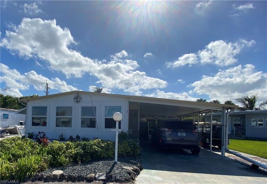 Celebrate the chance to bring this charming home back to life! With a subfloor of sturdy plywood, as a base, a 12 months old air conditioning and heating, a roof over in 2014 with a lifetime warranty, vinyl windows, and no damage on the outside of the home this property is ready for its next chapter. Although it experienced water damage from Hurricane Ian it still a home you can live in while making the repairs.  The backyard is lovely, perfect for entertaining with a large patio and a gazebo with tables and chairs. Old Bridge Village is a resident-owned 55+ community, a riverside paradise with endless activities, clubs, events, 2 pools, a hot tub, shuffleboard, a marina, boat and kayak launch, basketball and tennis courts, a fitness center, card and billiard room, and a waterfront fishing pier with breathtaking views of downtown Fort Myers. The current sale price reflects the home as is and pets are not allowed. Don't miss this exciting opportunity to make it yours!