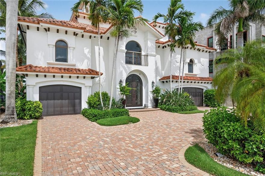 An exceptional, one-of-a-kind luxury elevator-equipped three-story retreat with Gulf-access and complete with a private dock able to accommodate a large vessel. This estate sits perfectly positioned on one of Conners’ widest canals (approximately 200 feet across), offering the waterfront lifestyle you’ve always dreamed of. Designed to impress, this architectural masterpiece showcases breathtaking water views from nearly every room and features expansive balconies on all three levels to maximize the beauty of Naples’ iconic waterways. Inside, the thoughtful layout includes 5 spacious bedrooms + study + oversized bonus room, 4 full baths + powder room, oversized 3-car garage with space for 3 vehicles + golf cart, and a large circular driveway accommodating 4+ cars. The open-concept great room with pocketing sliding glass doors seamlessly blend for the perfect indoor and outdoor living. The main level features the primary suite and study (both overlooking the water), as well as a private guest suite. The luxurious primary suite offers a handicap-accessible walk-in shower, his-and-her closets, a soaking tub, and even a massage table for spa-like relaxation. All suites have balconies overlooking the water. On the third floor, you’ll find three additional bedrooms (two with beautiful water views and balconies), a full kitchen, an oversized bonus/game room, and a spacious waterfront balcony, perfect for sunset gatherings. Modern comforts abound, including a whole-home music system with ceiling speakers and surround sound, large-screen TVs, upgraded high-speed internet, and luxury furnishings throughout. Step outside to your private oasis: a heated pool and spa with serene canal views, creating the ideal setting for sun-soaked afternoons or tranquil evenings under the stars. The home is fully outfitted with high-end linens, kitchenware, beach gear, outdoor living essentials, high-speed internet, and everything needed for a carefree stay. And best of all, you can walk to Wiggins beach, stroll to Sunday brunch at the Ritz-Carlton, the renowned Turtle Club with beachside dining, or enjoy dinner at BALEEN at La Playa. Whether boating to the Gulf, lounging poolside, or exploring Naples’ premier shops and restaurants, this residence offers an unmatched luxury experience that defines the pinnacle of Southwest Florida living. Shopping and dining at Mercato and Waterside, as well as tennis and pickleball are a short drive away. This one checks all the boxes! Why settle for ordinary when you can enjoy the BEST of the BEST for your coastal getaway?