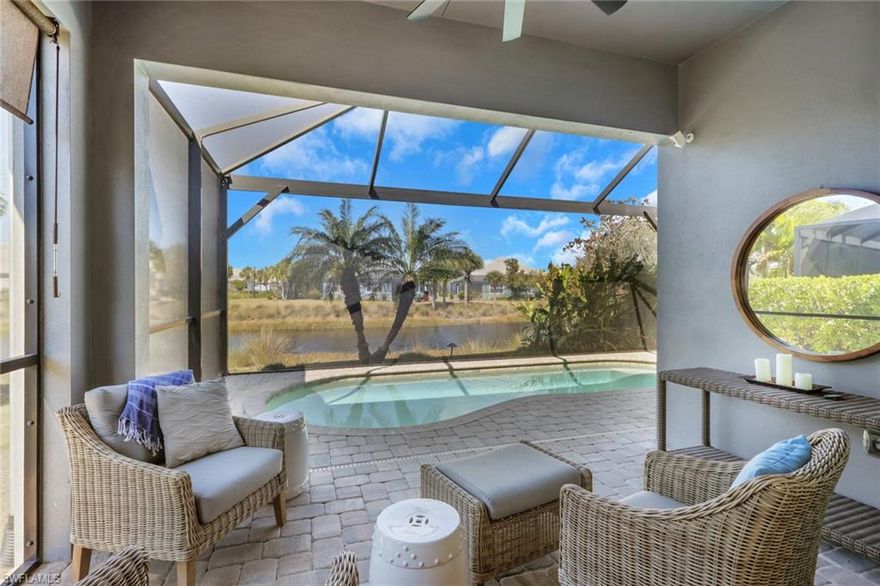 Nestled within the exclusive gated community of The Isles of Collier Preserve, this beautifully appointed and rarely available Petunia model villa offers a sophisticated blend of luxury, comfort, and serene water views. Impeccably maintained and offered fully turnkey with designer furnishings by Clive Daniel, this 2-bedroom plus den, 2-bath residence with a private pool showcases refined coastal elegance throughout. The open-concept floor plan flows effortlessly from the gourmet kitchen to the dining area and spacious great room, creating an inviting setting ideal for both entertaining and everyday living. The kitchen is thoughtfully upgraded with granite counter tops, 42-inch premium soft-close cabinetry, under-cabinet lighting, a generous center island, and a top-tier stainless steel appliance package. Elevated design details such as plantation shutters, tray ceilings, crown molding, and designer lighting enhance the home’s upscale appeal, while modern conveniences include an air-conditioned garage with epoxy flooring, impact-resistant windows and doors, Ring security system, ceiling fans, floor outlets, recessed lighting, and pre-wiring for cable and chandeliers. The versatile den, complete with French doors and a sleeper sofa, offers flexibility as a home office or additional guest space. Step outside to the expansive screened lanai featuring a sparkling heated saltwater pool and brand new “noseeum” screens—an ideal retreat for relaxing or entertaining while enjoying tranquil water views. Residents of The Isles of Collier Preserve enjoy an unparalleled resort lifestyle with a walk-in resort pool, lap pool, fitness center, 14 pickle ball courts, tennis and bocce courts, kayaking, scenic nature trails, bike paths, dog parks, and community boat rides along the Cypress Waterway. The vibrant social calendar and the onsite Overlook Bar & Grill provide exceptional opportunities for dining and connection without ever leaving the neighborhood. Located just minutes from the US Open Pickle ball Center and downtown Naples’ iconic Fifth Avenue South, with world-class beaches, fine dining, boutique shopping, and cultural attractions nearby. This villa combines the best of relaxed coastal living with resort style living for the ultimate Naples lifestyle!