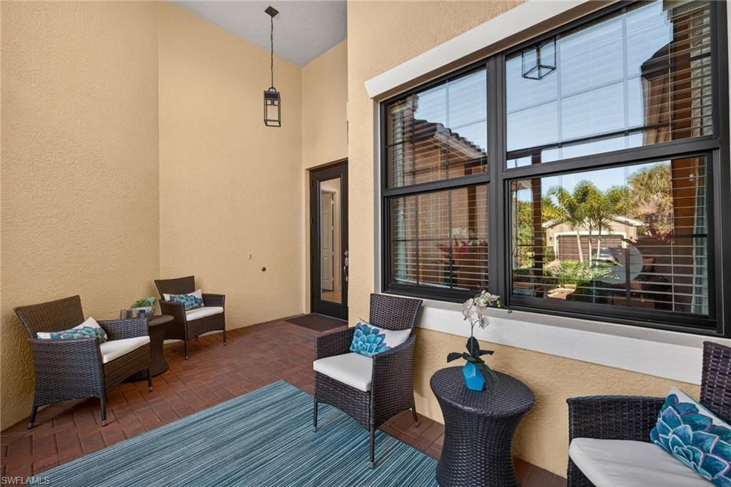 Photo of 13431 SILKTAIL DR, NAPLES, FL 34109 (MLS # 226005436)