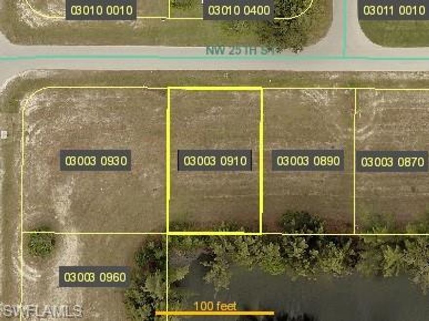 GREAT LOCATION ON WIDE CANAL!! This property is in the very desirable NW growing area. Near Many Parks and Coral Oaks Golf Course.